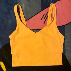 bright orange activewear crop top